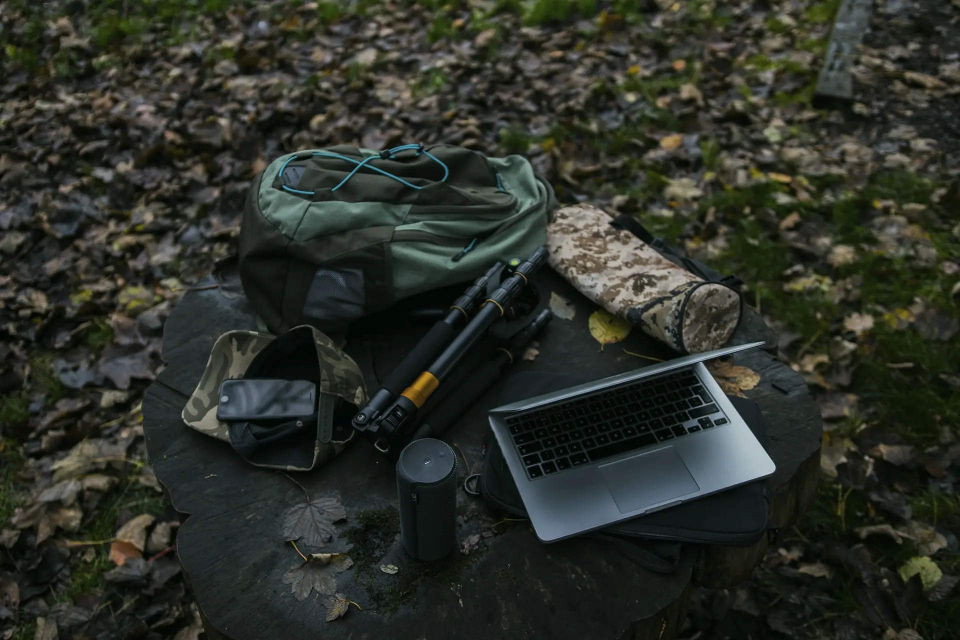 A laptop and field gear set up outdoors